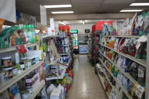 Pet store shelves products aisle