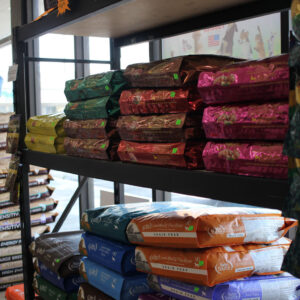 Pet store shelves with dog food