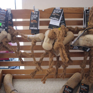 Wooden dog chews on display